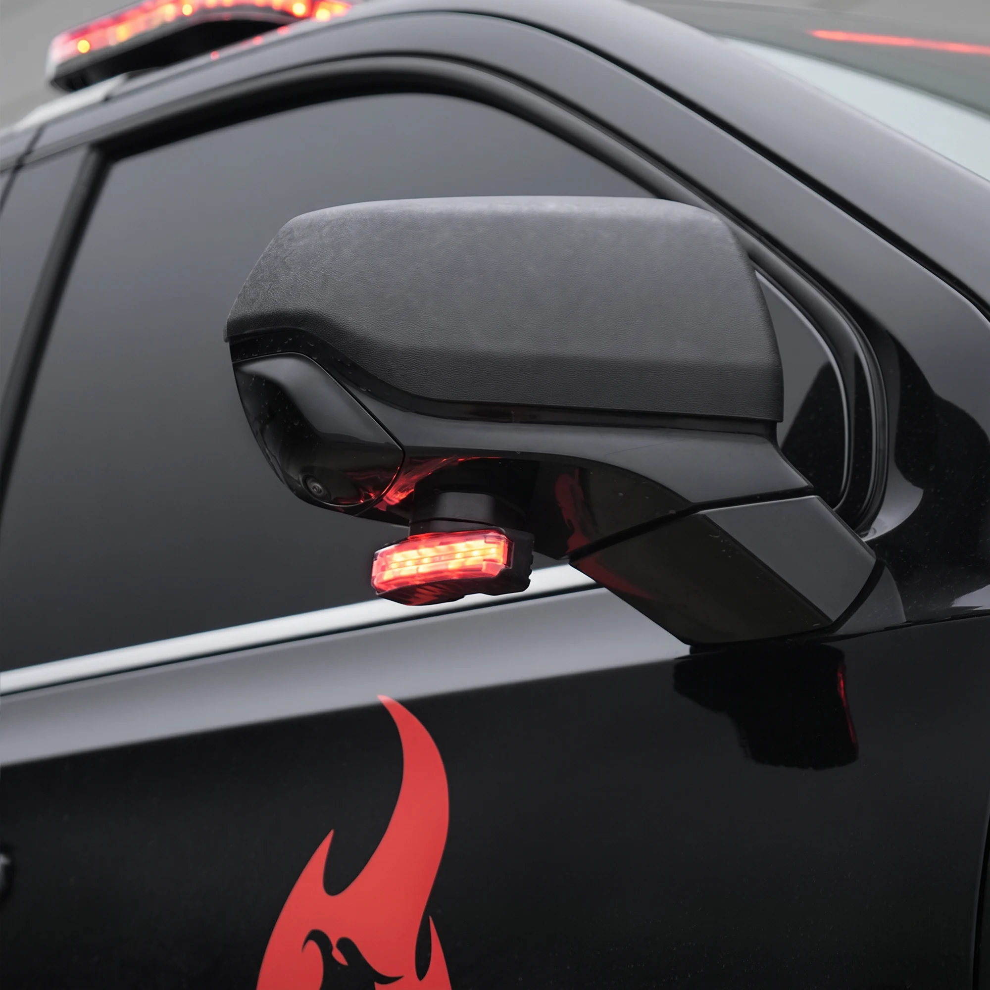 Q Under Mirror — installed on the vehicle