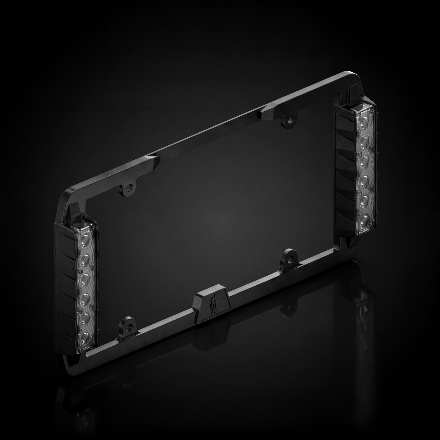 Feniex Fusion License Plate Mount on the black stage