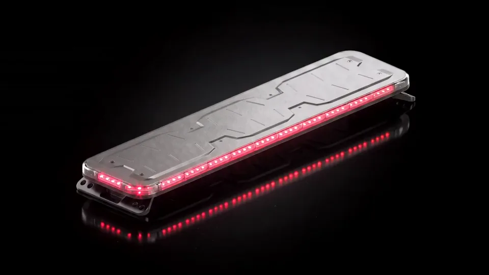 Quantum 49 light bar on black with its lamps lit, stepping slowly through red, blue and amber, green and white